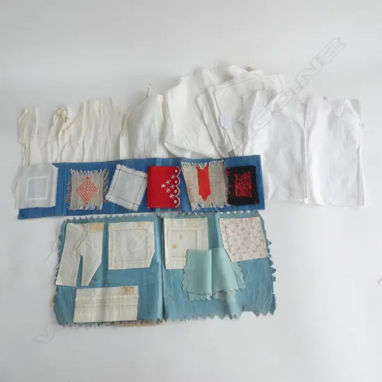 A childs needlework sampler book plus four antique babies first shirts.